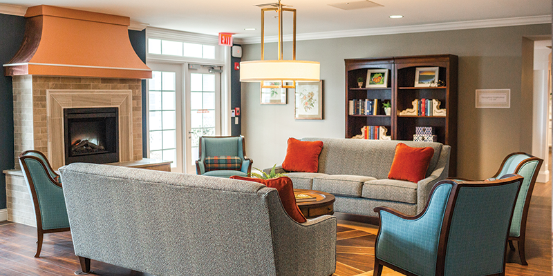 Cozy living space with comfortable furniture and a fireplace.